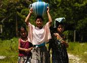 Girls collecting water in Guatemala